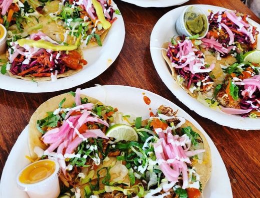 Three taco plates on a table from Shaka Tacoz in Captain Cook, Hawaii